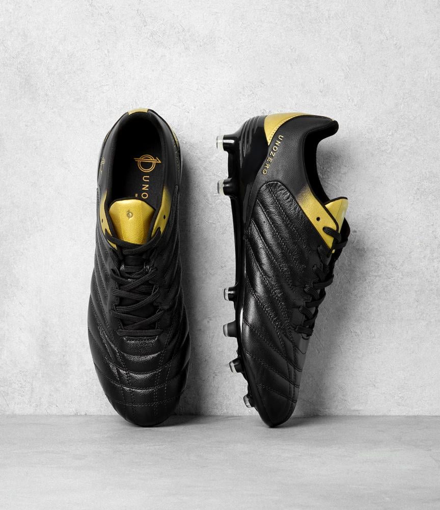 black and gold indoor soccer shoes